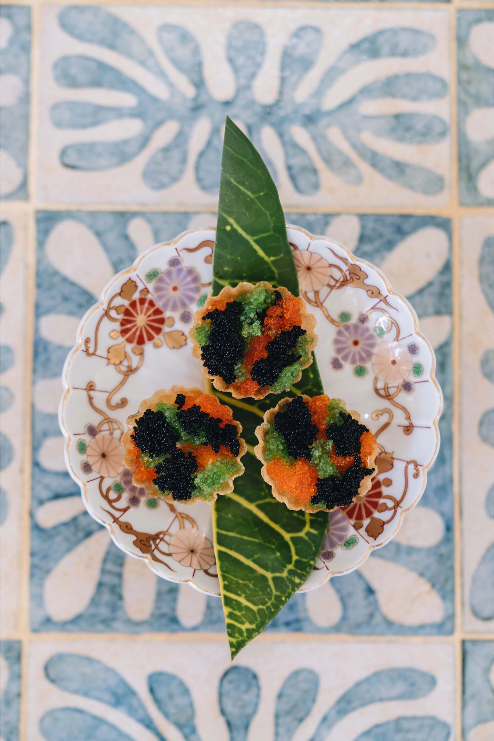 Top down view of dish with caviar and roe