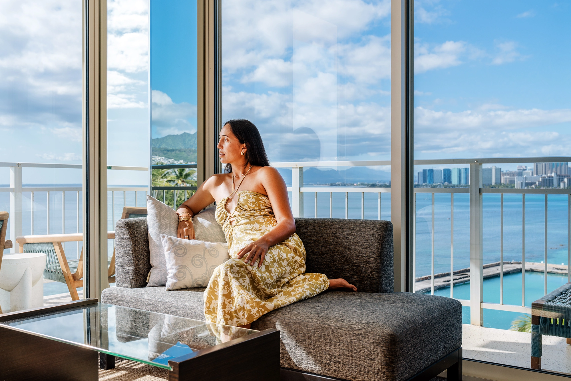 lady staring out from lounge chair