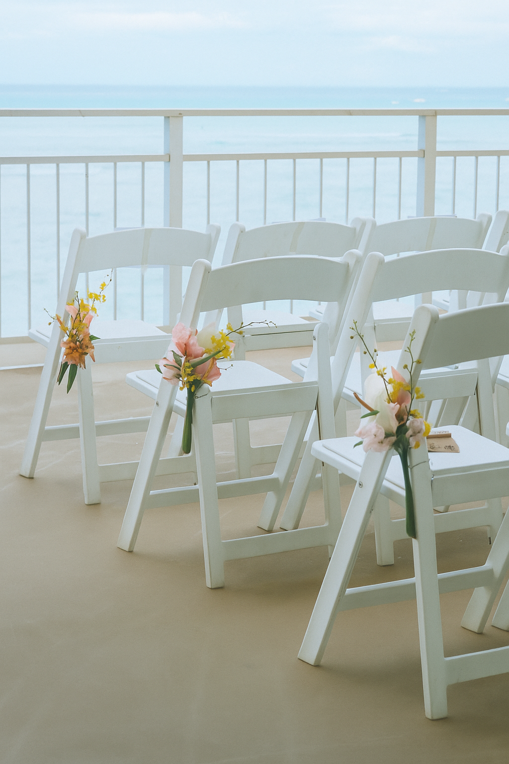 wedding chairs facing ocean